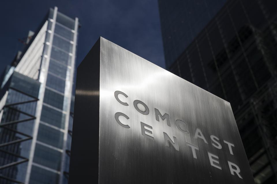 FILE- This May 21, 2018, file photo shows a sign outside the Comcast Center, which Liberty Property Trust built, in Philadelphia. Shares in Liberty Property Trust jumped 17% after the company announced it was being acquired by Prologis in a deal the commercial real estate companies are valuing at $12.6 billion including debt assumption. (AP Photo/Matt Rourke, File)