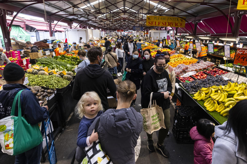 Customers are seen at the Queen Victoria Market in Melbourne, Saturday. Source: AAP