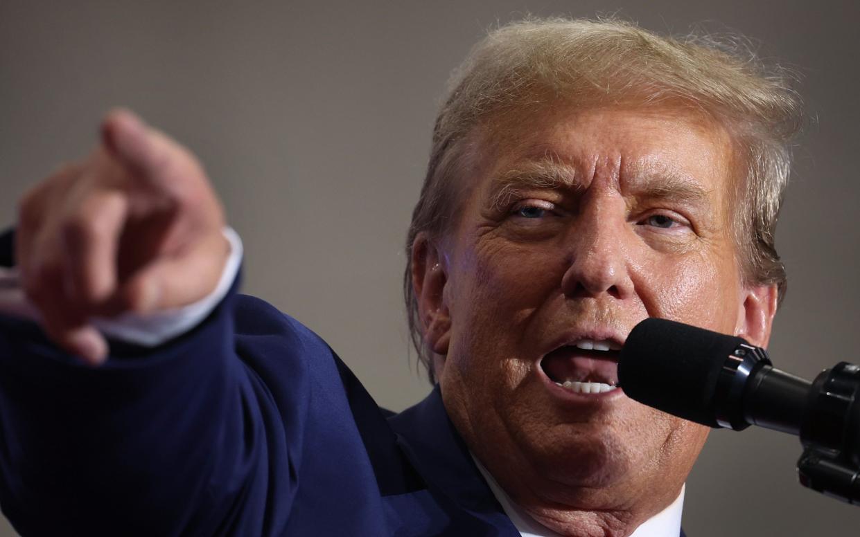 Former President Donald Trump speaks to guests at a rally on April 02, 2024 in Green Bay, Wisconsin