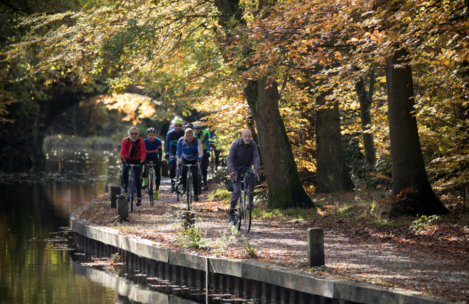 82-year-old Russ Mantle from Aldershot cycles along the Basingstoke Canal as he makes his way to the Canal Cafe in Mytchett, Surrey to cycle a million miles since he began recording his cycling distances in 1953.