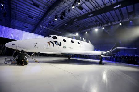 The new SpaceShipTwo, a six-passenger two-pilot vehicle meant to ferry people into space that replaces a rocket destroyed during a test flight in October 2014, is unveiled in Mojave, California, United States, February 19, 2016. REUTERS/Lucy Nicholson/Files