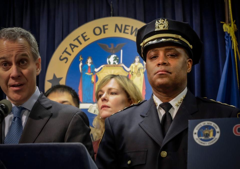 New York City Police Dept. Chief of Department Philip Banks, right, joins New York Attorney General Eric Schneiderman, left, at a news conference, in New York, on Jan. 30, 2014. New York City Mayor Eric Adams is naming Banks, whose phone was once wiretapped in a federal investigation, as his deputy mayor for public safety.