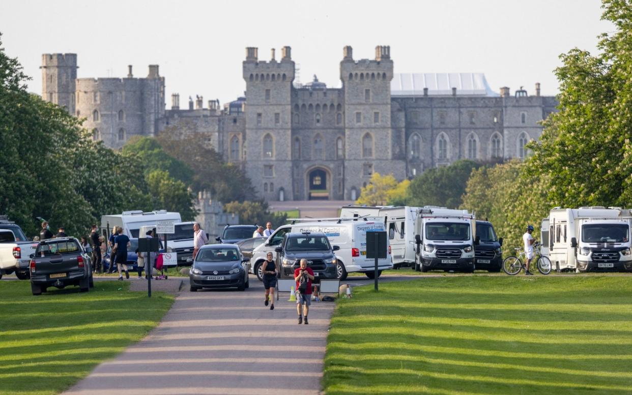 Up to 30 caravans and a number of vehicles parked on the Long Walk outside Windsor Castle - Jim Bennett /Kelvin Bruce