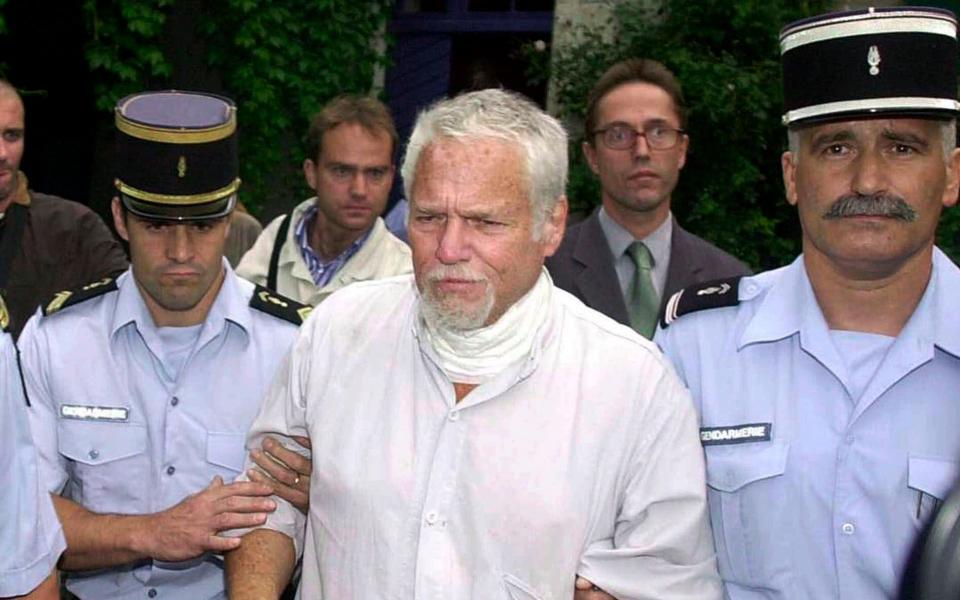 Einhorn is arrested in France in 2001 - AP