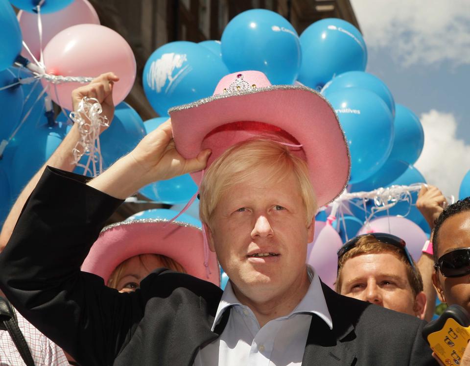 LONDON - JULY 05:  London Mayor Boris Johnson wears a pink stetson hat at the Gay Pride parade on July 5, 2008 in London, England. The parade consists of celebrities, floats, and performers celebrating the UK's largest gay and lesbian festival.  (Photo by Peter Macdiarmid/Getty Images)