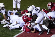 Indiana quarterback Michael Penix Jr. (9) goes in for a touchdown as he is tackled by Penn State's Lamont Wade (38) during the second half of an NCAA college football game, Saturday, Oct. 24, 2020, in Bloomington, Ind. (AP Photo/Darron Cummings)