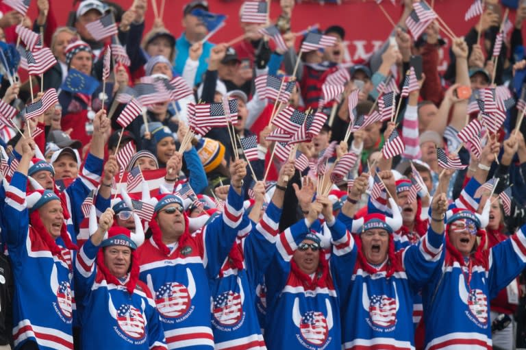 USA fans cheer during the Morning Foursome matches at the 41st Ryder Cup at Hazeltine National Golf Course in Chaska, Minnesota, September 30, 2016