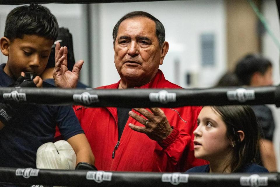 Head Trainer Gilbert Magallon coaches during a sparring session. Magallon has run the program at the Diamond Hill Community Center for more than two decades.