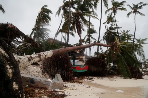 A man stands amid debris on the seashore Monday in Punta Cana, Dominican Republic. (Photo: Ricardo Rojas via Reuters)