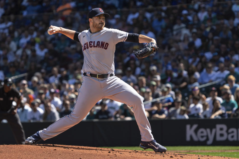 Cleveland Guardians starter Aaron Civale delivers a pitch during the first inning of a baseball game against the Seattle Mariners, Sunday, Aug. 28, 2022, in Seattle. (AP Photo/Stephen Brashear)