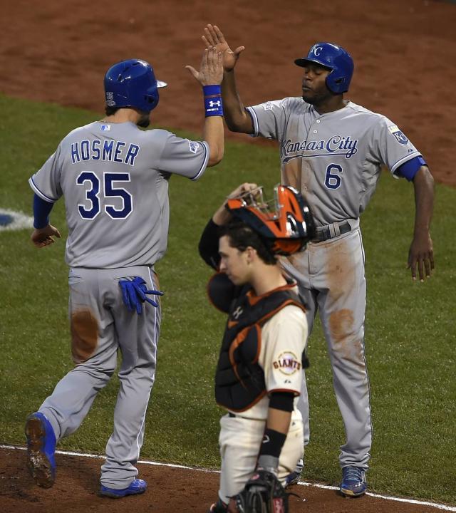 Former Kansas City Royals center fielder Lorenzo Cain gets emotional as he  talks about his mother Patricia Cain, right, during a retirement  celebration before a baseball game against the Oakland Athletics in