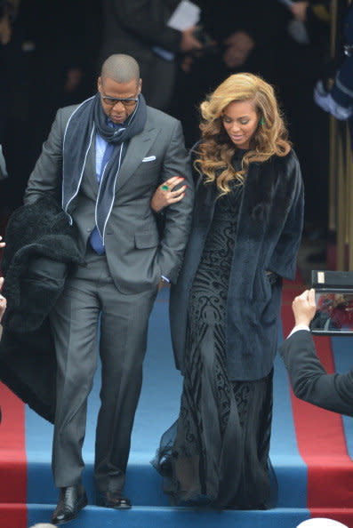 Beyonce and husband Jay-Z arrive for the 57th Presidential Inauguration ceremonial swearing-in of President Barack Obama at the US Capitol on January 21, 2013 in Washington, DC. The oath is to be administered by US Supreme Court Chief Justice John Roberts, Jr. AFP PHOTO/Jewel Samad (Photo credit should read JEWEL SAMAD/AFP/Getty Images) 