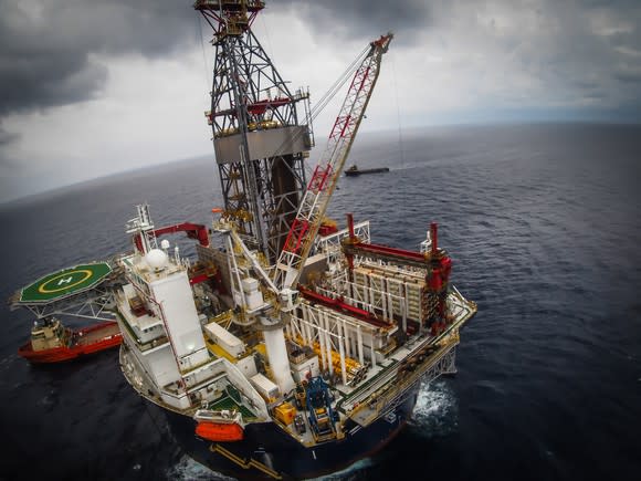 An offshore drilling rig at sea.