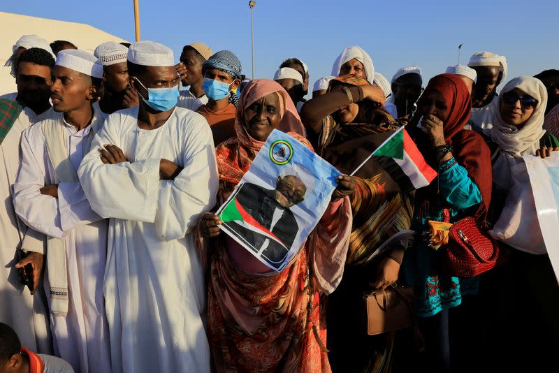 Supporters of Sudanese political and religious leader gather at the airport to welcome him in Khartoum