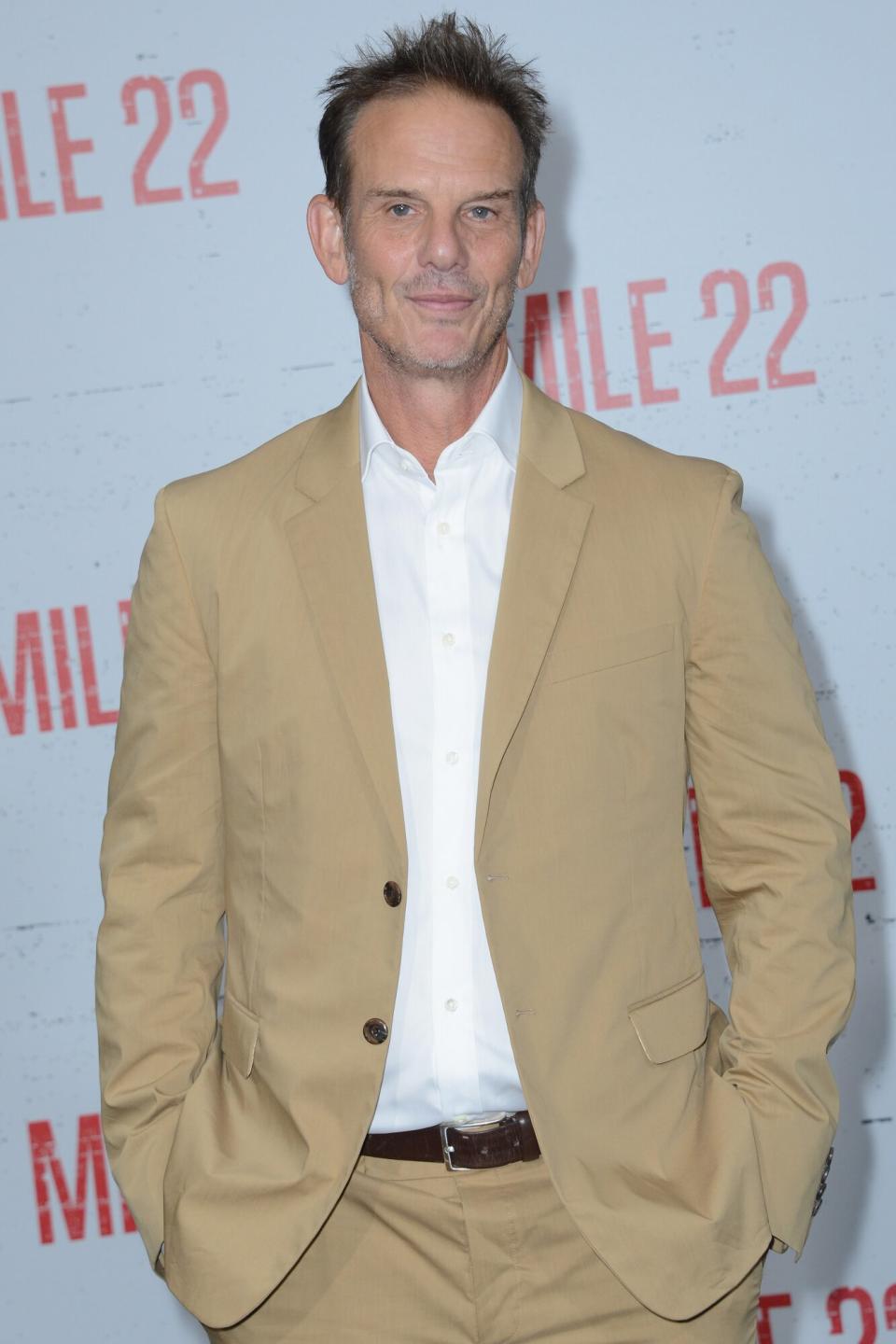 Director Peter Be.rg arrives for the Premiere Of STX Films' "Mile 22" held at Westwood Village Theatre on August 9, 2018 in Westwood, California