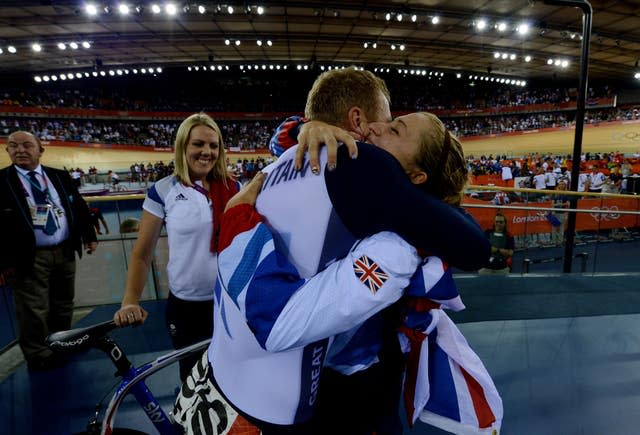 Chris Hoy hugs Laura Kenny (then Trott) after winning gold at the London Olympics in 2012