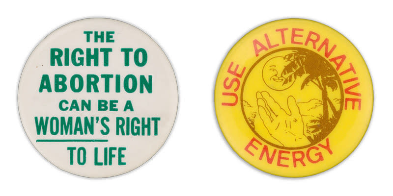 A button on the left reads "The right to abortion can be a woman's right to life" with the word "woman's" underlined; a button on the right shows an illustration hand gesturing toward a tree and smiling sun, encircled by the words "use alternative energy"