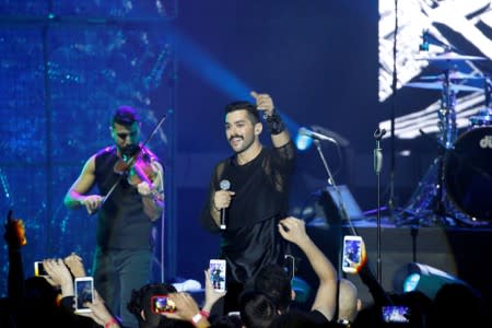 FILE PHOTO: Hamed Sinno, lead singer of Lebanese alternative rock band Mashrou' Leila performs during the Ehdeniyat International Festival in Ehden town