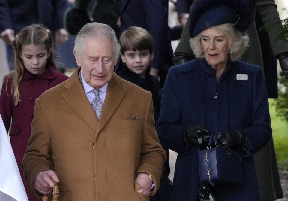 Princess Charlotte, from left, King Charles III, Prince Louis and Camilla, the Queen Consort leave after attending the Christmas day service at St Mary Magdalene Church in Sandringham in Norfolk, England, Sunday, Dec. 25, 2022. (AP Photo/Kirsty Wigglesworth)