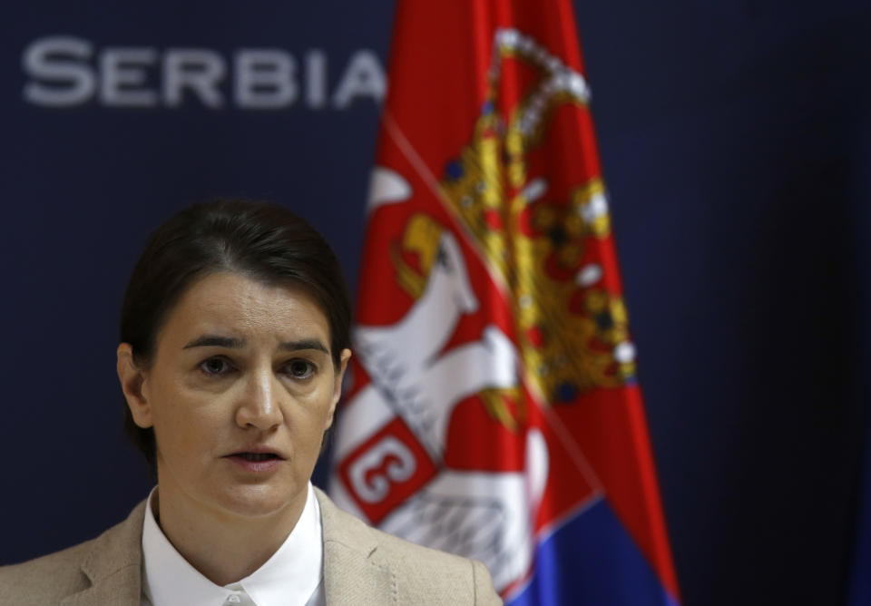 In this photo taken Tuesday, Nov. 21, 2017, Serbian Prime Minister Ana Brnabic speaks during a press conference in Belgrade, Serbia. Serbia's prime minister warned on Wednesday that the formation of a Kosovo army could trigger Serbia's armed intervention in the former province — the bluntest warning so far amid escalating tensions in the Balkans. (AP Photo/Darko Vojinovic)