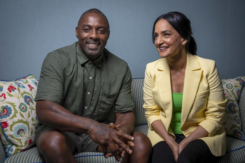 Idris Elba, left, and Archie Panjabi pose for portrait photographs to promote the television series "Hijack'"on Monday, June 26, 2023 in London. (Scott Garfitt/Invision/AP)