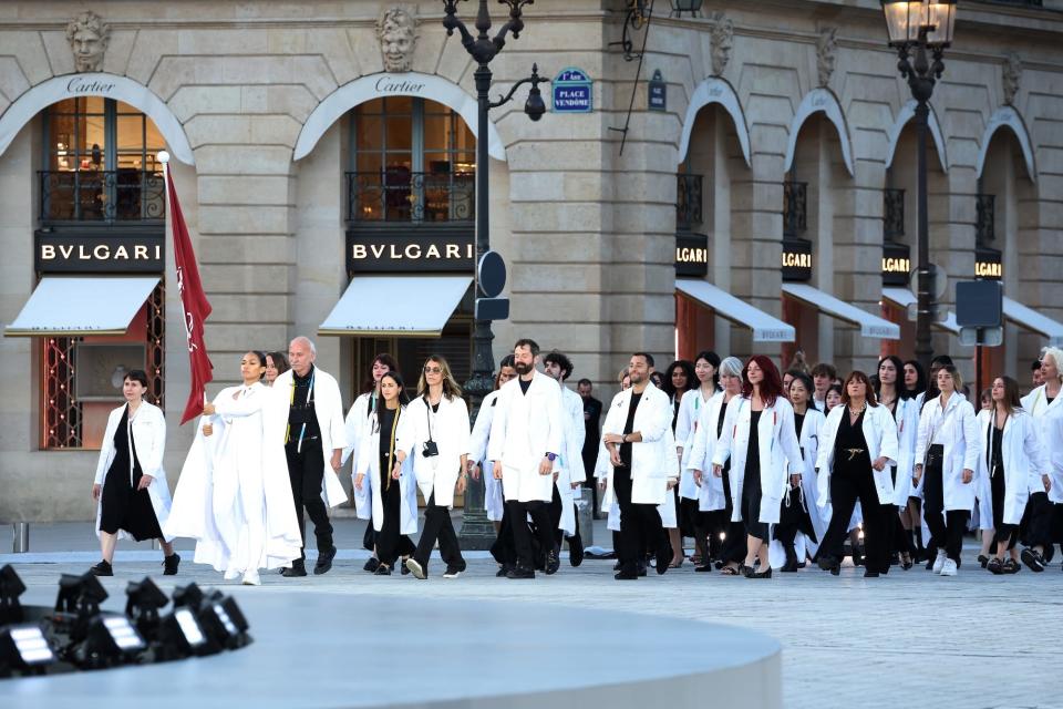 Tailors and seamstresses walk the runway at Vogue World 2024.