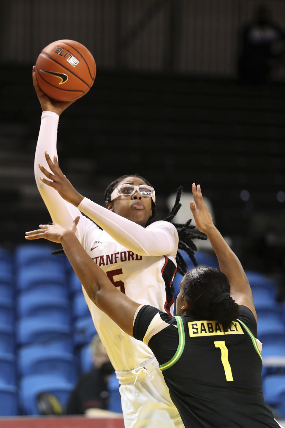 Stanford forward Francesca Belibi shoots against Oregon forward Nyara Sabally during the first half of an NCAA college basketball game in Santa Cruz, Calif., Friday, Jan. 8, 2021. (AP Photo/Jed Jacobsohn)