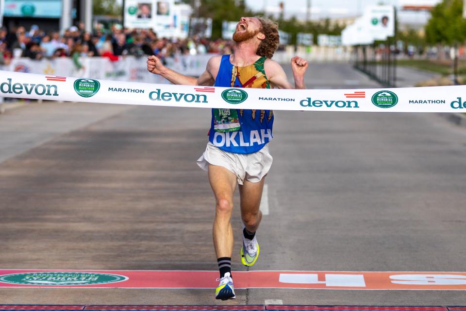 Al Maeder wins with a time of 2:25:14 during the Oklahoma City Memorial Marathon on Sunday.