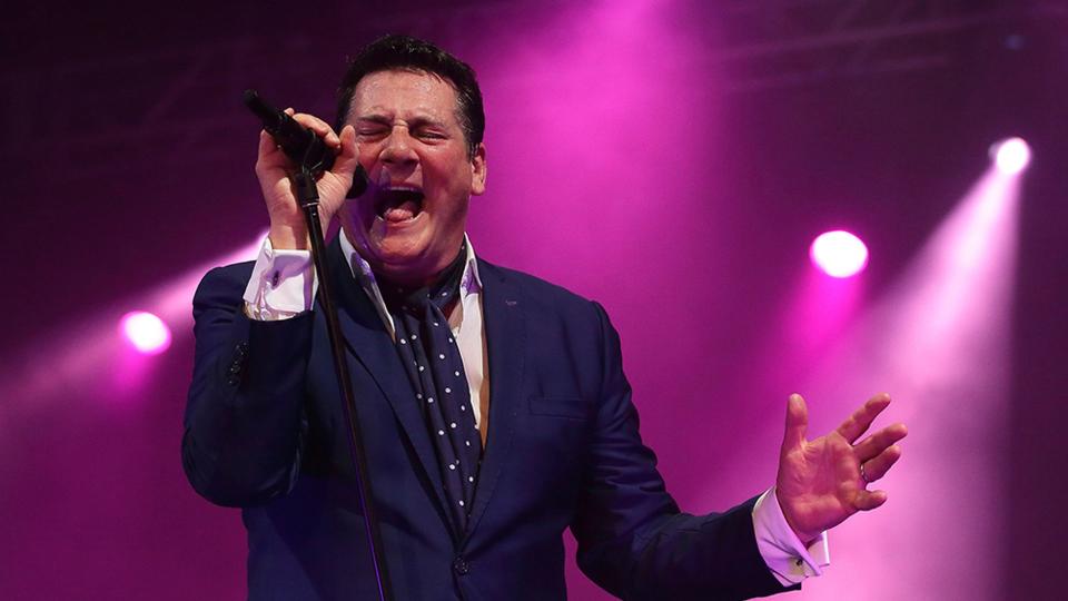 Tony Hadley singing on stage