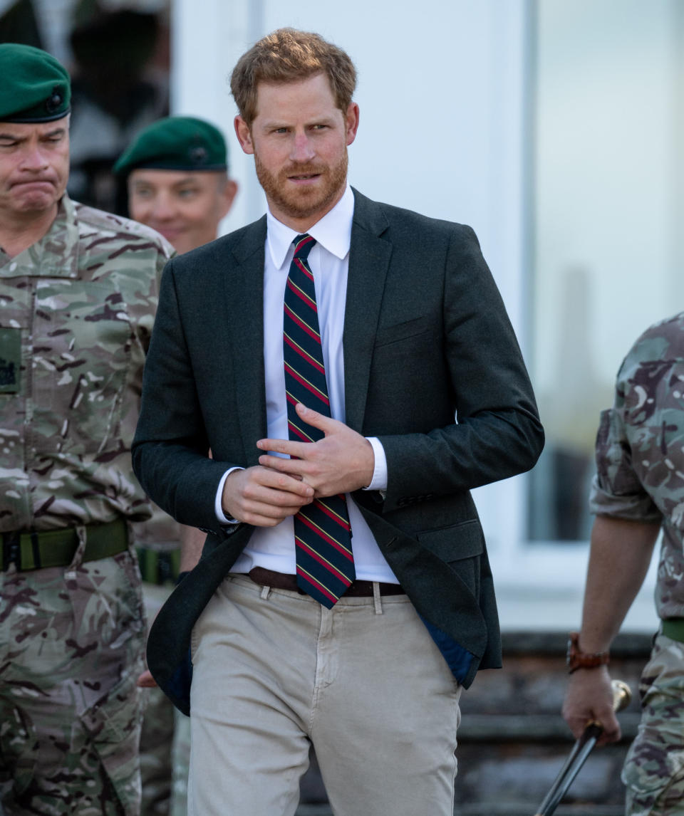 According to a body language expert, the Prince fiddling with his ring most likely means he’s missing his wife. Aww! (Photo via Getty Images)