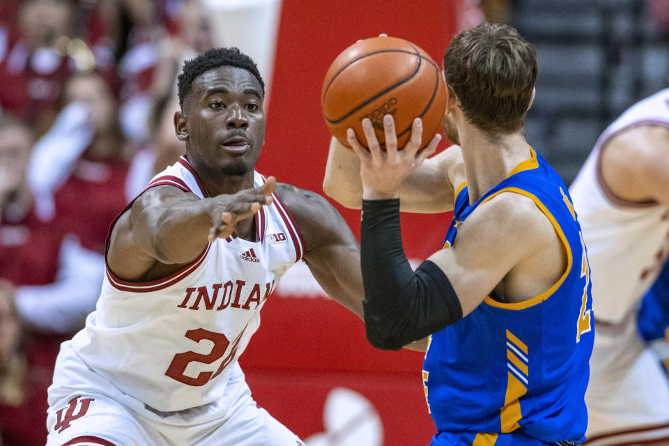 Indiana forward Jordan Geronimo (22) defends against Morehead State guard Jake Wolfe (24) during the second half of an NCAA college basketball game Monday, Nov. 7, 2022, in Bloomington, Ind. (AP Photo/Doug McSchooler)