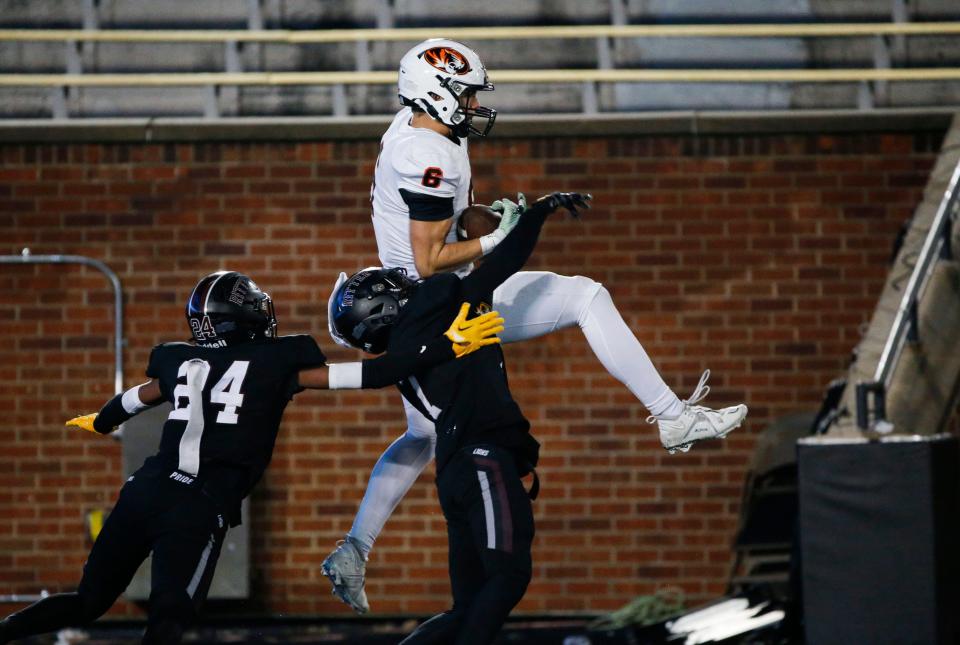 Republic's James Rexroat (6) makes a catch in the end zone for a touchdown as the Tigers took on the Cardinal Ritter Lions in the Class 5 State Championship football game at Faurot Field in Columbia, Mo. on Friday, Dec. 1, 2023.