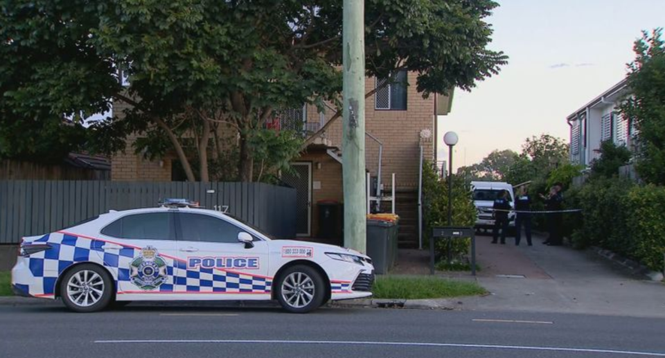 Police seen on York St in Nundah in Brisbane after a woman's body was found in a unit. 
