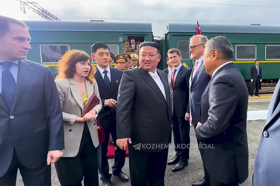 In this image made from video released by governor of the Russian far eastern region of Primorsky Krai Oleg Kozhemyako telegram channel on Saturday, Sept. 16, 2023, North Korea's leader Kim Jong Un, center, speak to officials upon his arriving in Vladivostok, Russian Far East. (Governor of the Russian far eastern region of Primorsky Krai Oleg Kozhemyako telegram channel via AP)