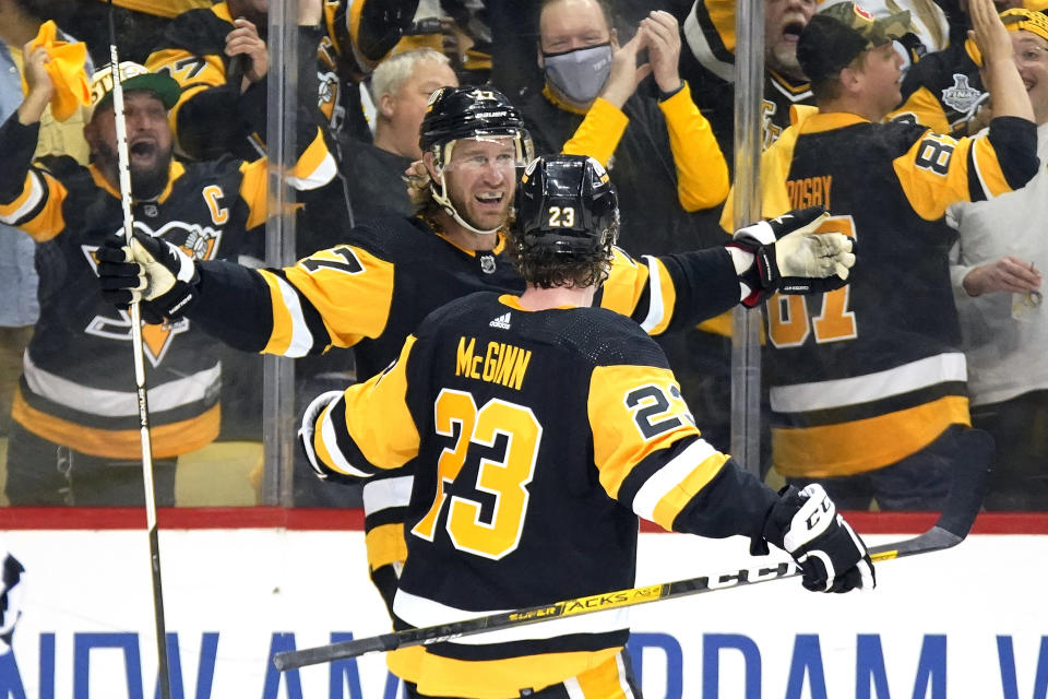 Pittsburgh Penguins' Jeff Carter (77) celebrates his goal during the second period in Game 4 of an NHL hockey Stanley Cup first-round playoff series against the New York Rangers in Pittsburgh, Monday, May 9, 2022. (AP Photo/Gene J. Puskar)