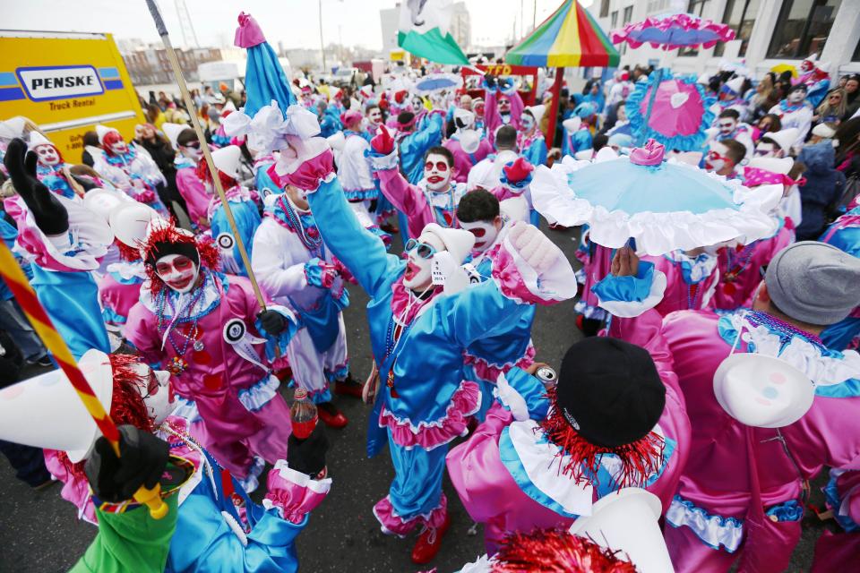 Mummers dance ahead of the annual New Year's Day parade, Wednesday, Jan. 1, 2014, in Philadelphia. (AP Photo/Matt Rourke)