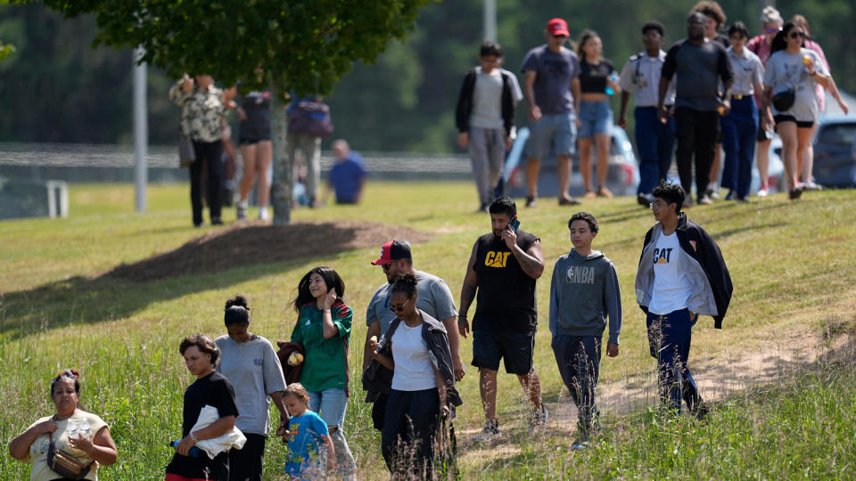 Students and parents leave the campus of Apalachee High School, Wednesday in Winder, Georgia. (Mike Stewart/AP)