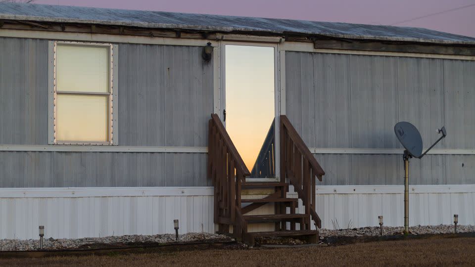 Light reflects through the door of a home in Pembroke, a small town that is the cultural, economic and political center of the Lumbee tribe. - Maria Sturm