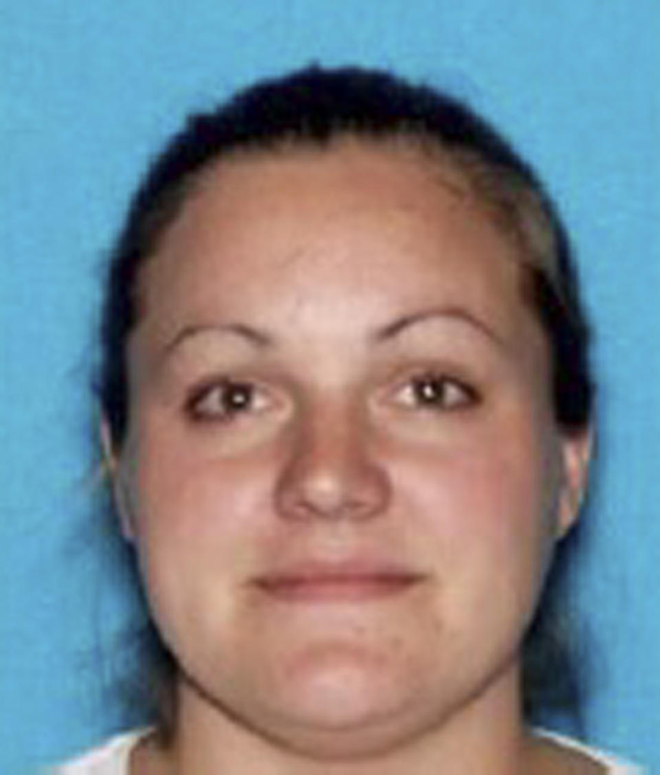 This image provided by the Napa Police department shows Sara Krueger, who was detained at a San Francisco Bay Area commuter train station along with Ryan Scott Warner, Sunday Feb. 2, 2014 in the city of El Cerrito, Calif. The couple was wanted for questioning in the death of Krueger's 3-year-old daughter. (AP Photo/Napa Police Department)