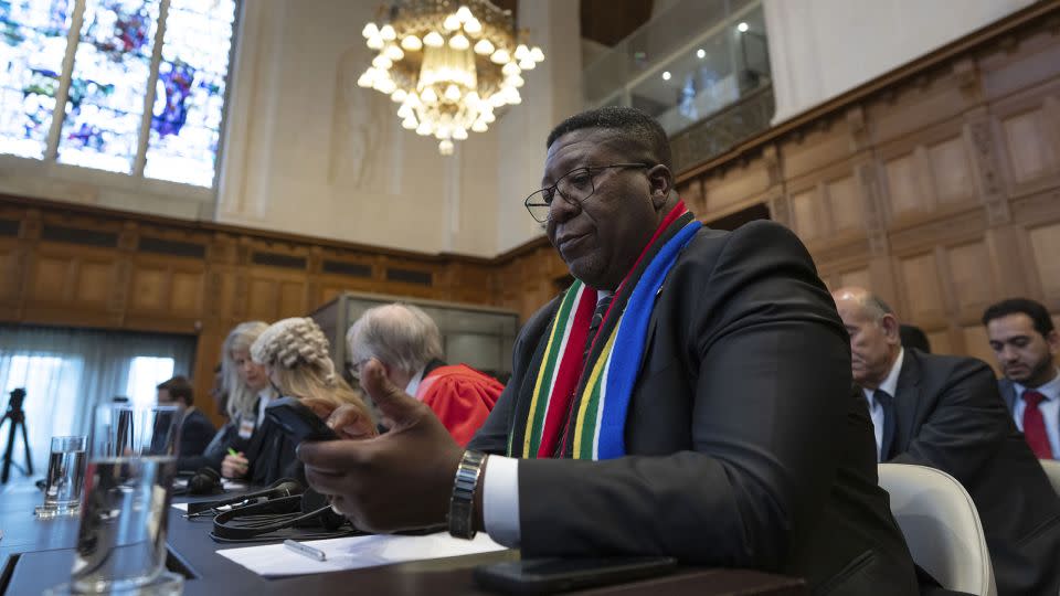 Ambassador of the Republic of South Africa to the Netherlands, Vusimuzi Madonsela, waits for judges to enter the International Court of Justice in The Hague, Netherlands on Friday. - Peter Dejong/AP