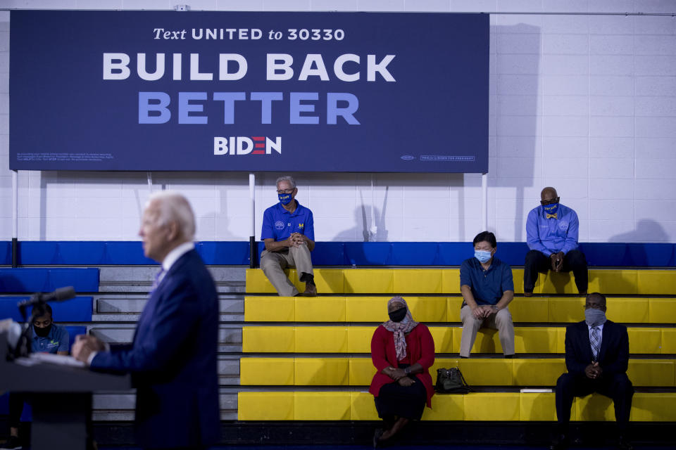 FILE - In this July 28, 2020, file photo Democratic presidential candidate former Vice President Joe Biden speaks at a campaign event at the William "Hicks" Anderson Community Center in Wilmington, Del. Biden sounds every bit the Democratic standard-bearer as he frames the federal government as the collective force to combat the coronavirus, rebuild the economy and address centuries of institutional racism and systemic inequalities. (AP Photo/Andrew Harnik, File)