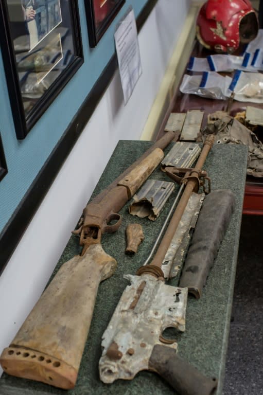 Weapons and personal belongings of US soldiers recovered in Vietnam displayed at the Defense POW/MIA Accounting Agency in Hanoi