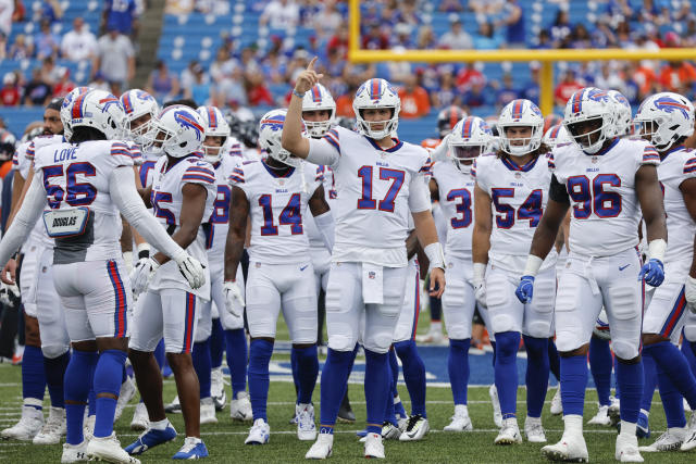 Buffalo Bills quarterback Josh Allen (17) leads teammates in a huddle  before entering the field to play against the Cincinnati Bengals in an NFL  division round football game, Sunday, Jan. 22, 2023