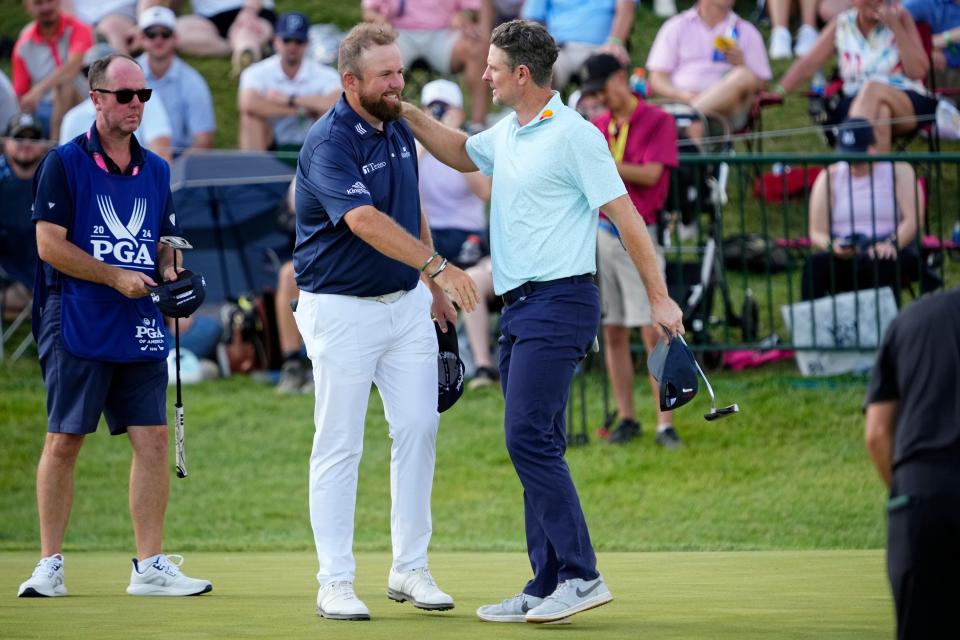 May 18, 2024; Louisville, Kentucky, USA; Shane Lowry is congratulated by by Justin Rose after hitting a 62 during the third round of the PGA Championship golf tournament at Valhalla Golf Club.