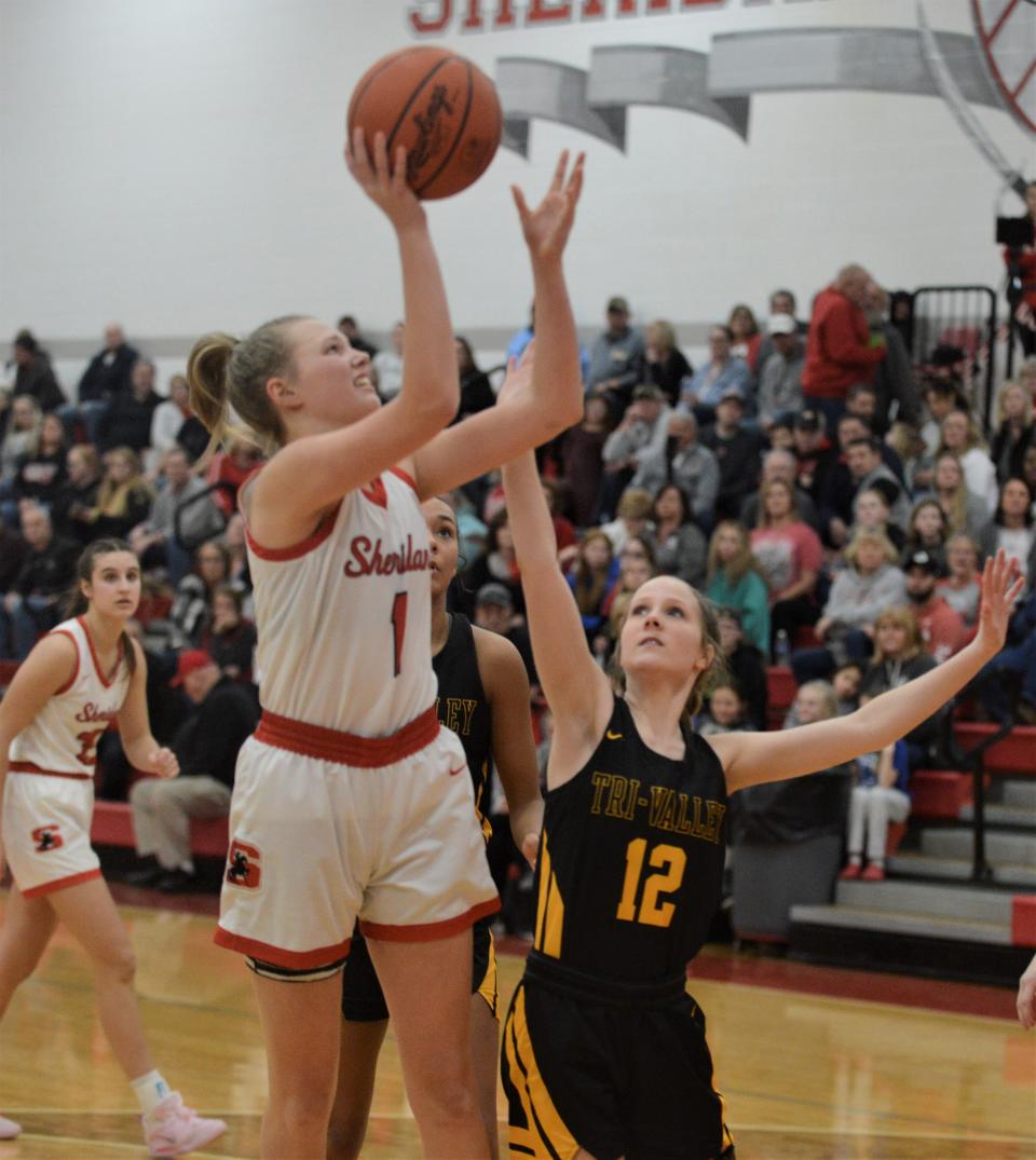 Sheridan's Jamisyn Stinson puts up a shot over Tri-Valley's Karlee Rose in Saturday's game. The Generals won 47-38.