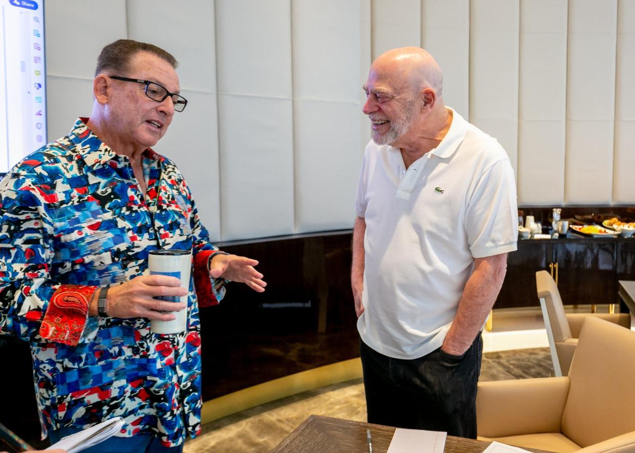 Developer Al Adelson, left, speaks with Ron Shear, right, in 2019. Shear bought a condo at The Bristol, an Adelson development that is the priciest condo ever built in Palm Beach County. Now Adelson is building The Berkeley, which will have a similar high-end style as The Bristol, but will be geared more to families. "Our market is the people coming to work here but who aren't the chairman or the president of the company," Adelson said. "Still, they earn a very good living."