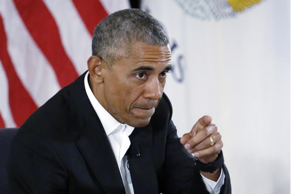 FILE - In this May 3, 2017 file photo, former President Barack Obama points as he arrives at a community event on the Presidential Center at the South Shore Cultural Center in Chicago. Former President Barack Obama's presidential center will move another step closer to its brick-and-mortar future when ground is broken next week after years of reviews, other delays and local opposition. (AP Photo/Nam Y. Huh)