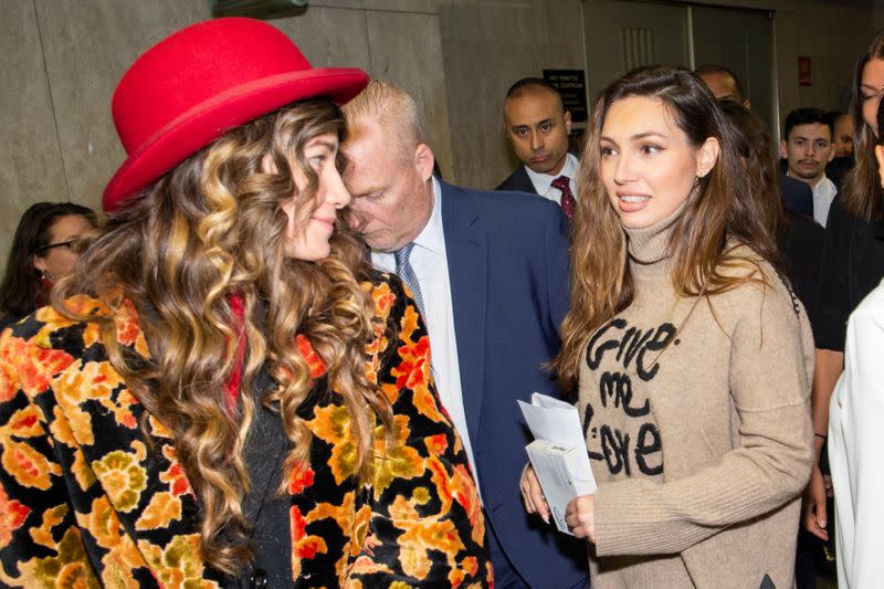 Actress and model Lauren Young, (L) and victim former actress Jessica Mann (R) exit the courtroom after listening to the sentencing for film producer Harvey Weinstein for sexual assault following his trial at New York Criminal Court in the Manhattan borough of New York City