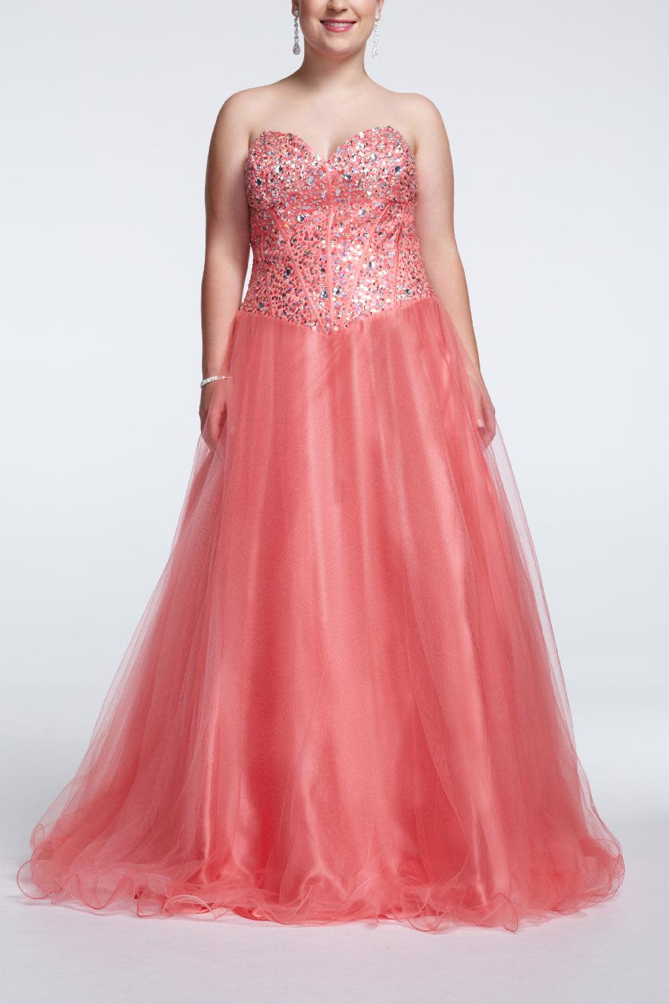 This undated image released by David's Bridal shows a popular prom gown design offered at David's Bridal. Clothes shopping for plus-size teens can be frustrating in general, but shopping for a dream prom dress can be a tear-inducing, hair-pulling morass of bad design and few options _ especially for girls who want a dress that hugs the body instead of tenting it. (AP Photo/David's Bridal)