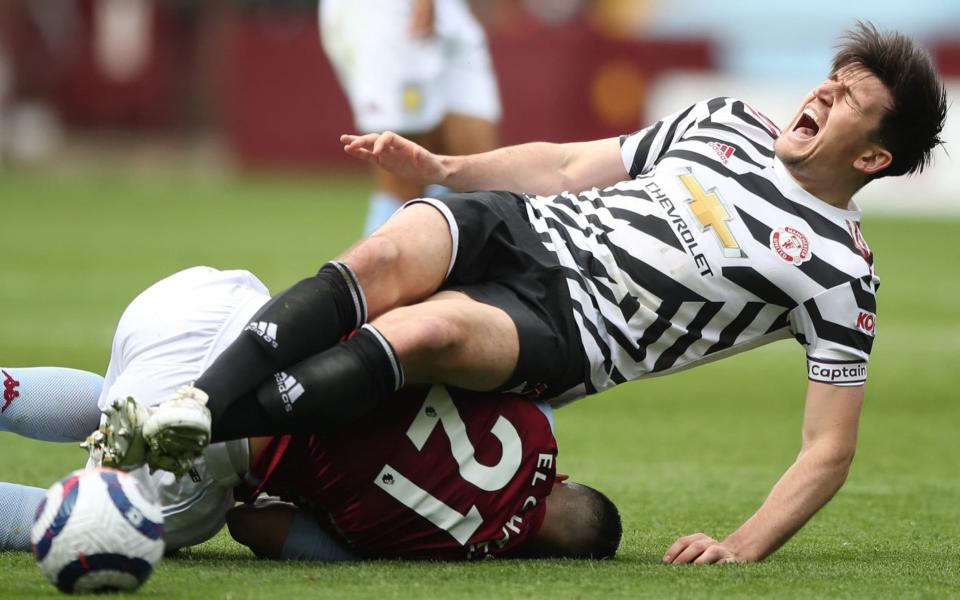 Harry Maguire was forced off injured after a heavy tackle - POOL/AFP via Getty Images